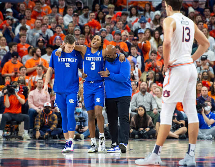 Kentucky Wildcats TyTy Washington Jr. (3) is helped off the court with an injury as Auburn Tigers men's basketball takes on Kentucky Wildcats at Auburn Arena.